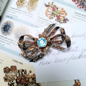 vintage hobe sterling floral brooch with 14k gold